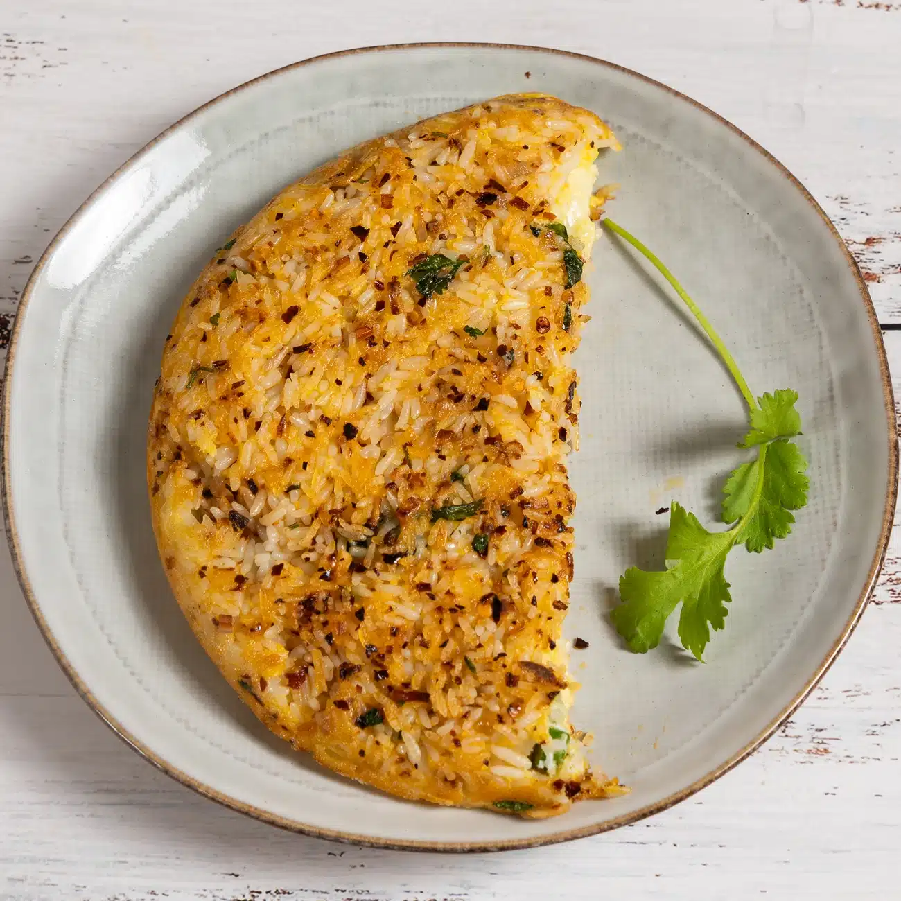 Transform Leftover Rice: Easy Crispy Omelette in Minutes